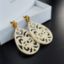 Picture of Ornament-Ohrstecker - Tropfenform aus Resin - off white